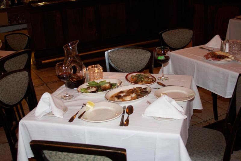 Casual dining space with neatly set tables.